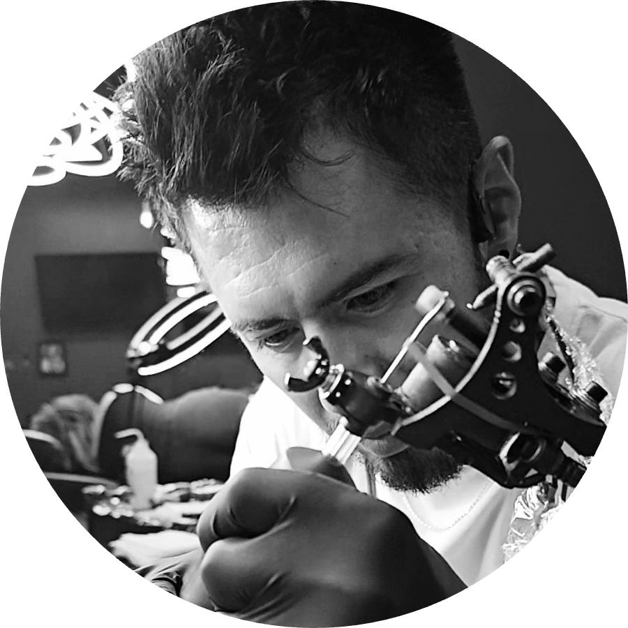 Tattoo artist Townsville preparing stencil for custom tattoo